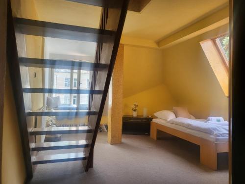 Ein Bett oder Betten in einem Zimmer der Unterkunft Hotel Lužná