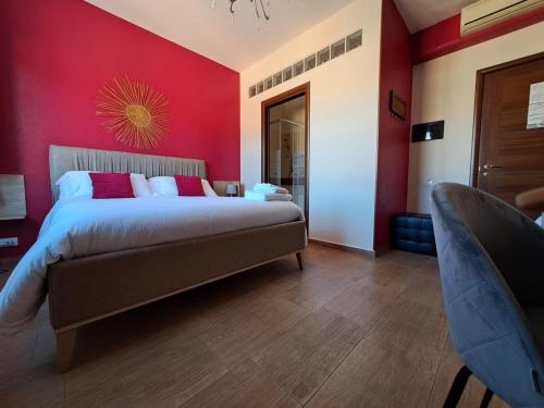 Ένα ή περισσότερα κρεβάτια σε δωμάτιο στο B&B Domu Mea