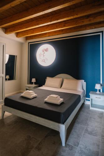 Postel nebo postele na pokoji v ubytování Terrazza sulle mura Appartamento Luna