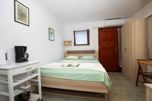 Postel nebo postele na pokoji v ubytování Apartment Matija