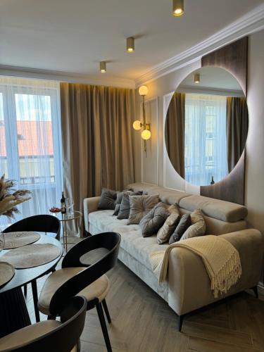 Khu vực ghế ngồi tại Family & Business Sauna Apartments No7 Złota Centrum VIP Unikat SPA - 3 Bedroom with Private Sauna, Jacuzzi, Balcony, Parking -Piękny Apartament