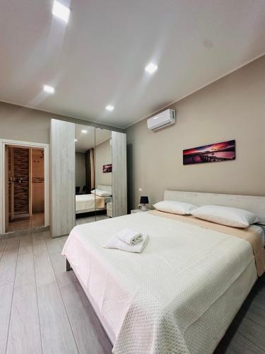 Ένα ή περισσότερα κρεβάτια σε δωμάτιο στο Horus Home
