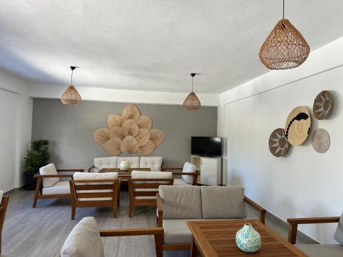 a living room with a couch and a table at Paloma Family Club in Bitez