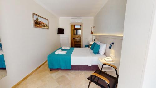Casamia Hotelにあるベッド