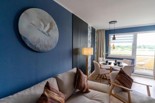 Posezení v ubytování Zauberhafte Ferienwohnung in Barby Balkon mit Elbblick am Elbe-Saaleradweg