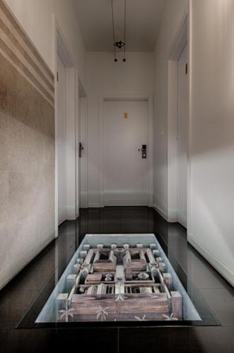 a room with a stove in the middle of a room at Dream Luxury Rooms in Split
