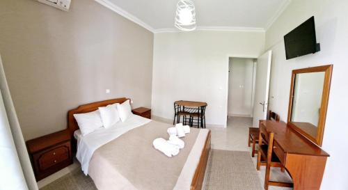 Кровать или кровати в номере Vesta House