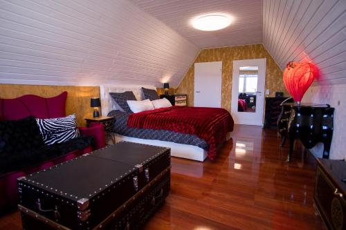 Postel nebo postele na pokoji v ubytování Boutique-Hotel Art Zone Ranch