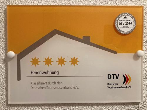 a sign for a diy diagram of a house at 4 Sterne Ferienwohnung Sommerberg inklusive Gästekarte in Rohrbach