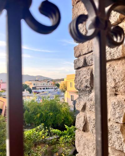 a view from a window of a city at Ichnos experience room in Villasimius