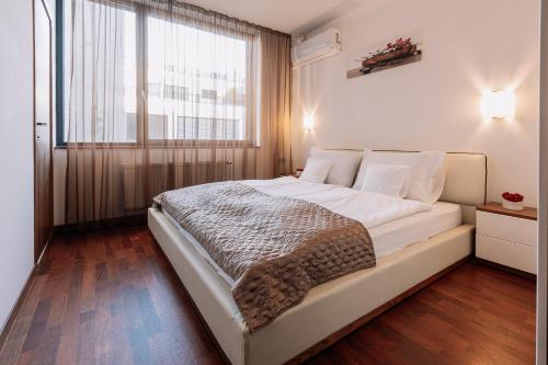 Posteľ alebo postele v izbe v ubytovaní REVON Business apartment 50 Dunajská