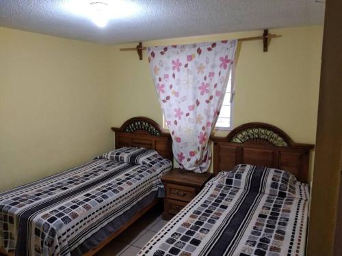 Una cama o camas en una habitación de La casa Rustica