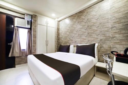 Katil atau katil-katil dalam bilik di Hotel O Urban villa