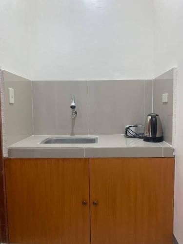 Η κουζίνα ή μικρή κουζίνα στο Llaguno City Inn