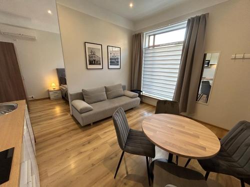 Zona de estar de Jon`s Apartments