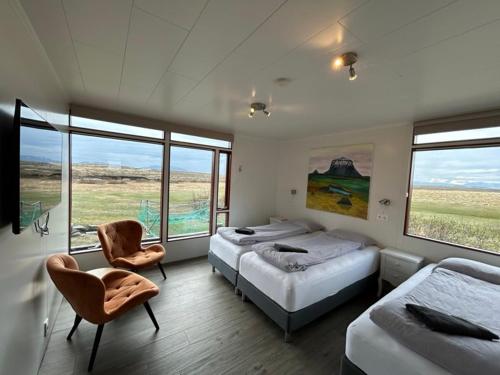 Postel nebo postele na pokoji v ubytování Grímstunga Guesthouse Hólsfjöll