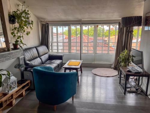 Χώρος καθιστικού στο Ici c'est Cosy - Centre