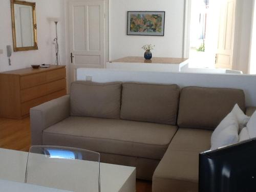 a living room with a couch and a table at Bellvedere in Tivat
