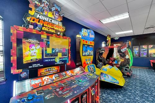 a room with arcade games and video game machines at Trendy Retreat - Great Location - Fully Loaded in Kissimmee