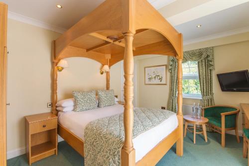 En eller flere senge i et værelse på Moorhill House Bed & Breakfast