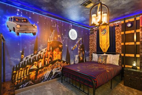a bedroom with a mural of a castle and a car at Top 5 percent Luxury Villa at Storey Lake mins to Disney in Kissimmee