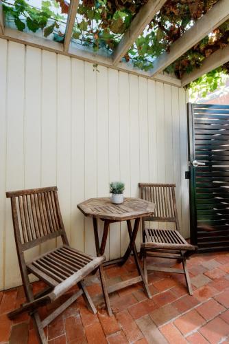 a table and two chairs on a patio at Alexandra Place in Bendigo