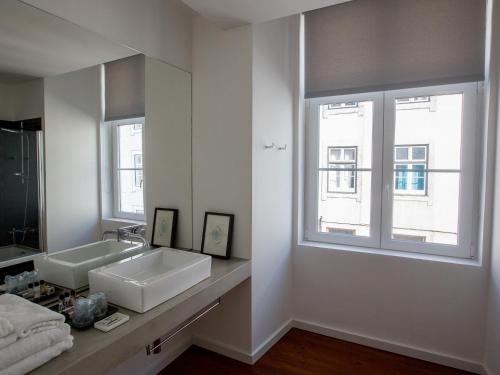 Ένα μπάνιο στο The 8 - Downtown Suites