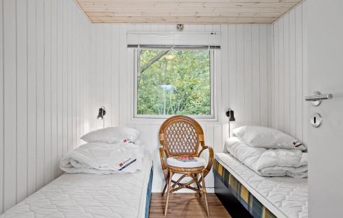 Postel nebo postele na pokoji v ubytování 3 Bedroom Lovely Home In Thyholm