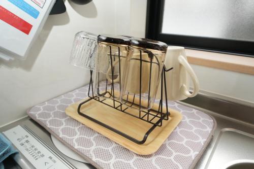 a blender sitting on top of a kitchen counter at 三十三Kin in Kyoto
