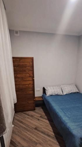 Tempat tidur dalam kamar di Tun Getapi