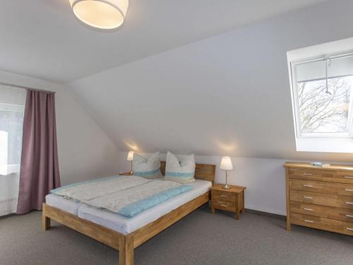 Ένα ή περισσότερα κρεβάτια σε δωμάτιο στο Haus Residence Comfortable holiday residence