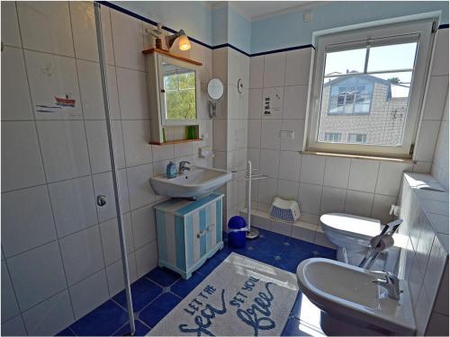 Ένα μπάνιο στο Sea Cucumber Comfortable Holiday Residence