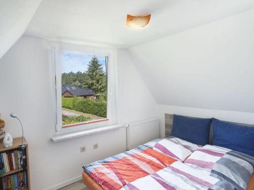 En eller flere senge i et værelse på Below Comfortable holiday residence