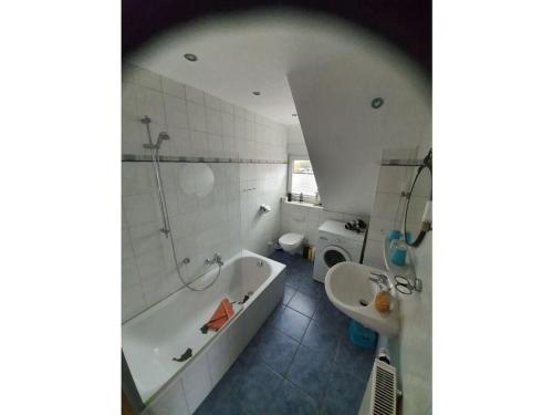 Ένα μπάνιο στο Kleiner Seehund Comfortable holiday residence