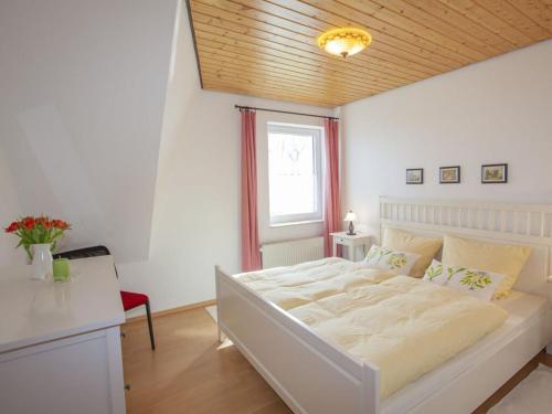 Ένα ή περισσότερα κρεβάτια σε δωμάτιο στο Five Sleepers Comfortable Holiday Residence