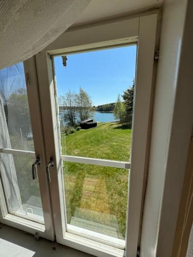 Gallery image of Majas Backe on a island with boat in Hammarland