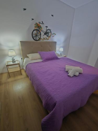 Postel nebo postele na pokoji v ubytování Apartments LOTUS