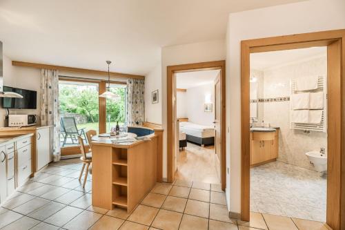 Kuchyň nebo kuchyňský kout v ubytování Apartments Scherlin