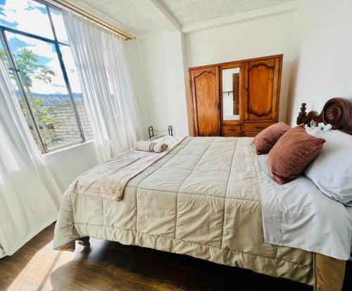 Postel nebo postele na pokoji v ubytování Martita's Home