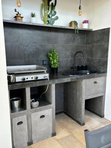 Dapur atau dapur kecil di Joli havre de paix