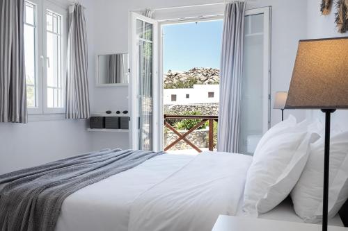 Posteľ alebo postele v izbe v ubytovaní Baos Pool Villas
