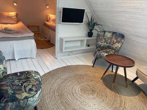 Katil atau katil-katil dalam bilik di Galleriet BnB