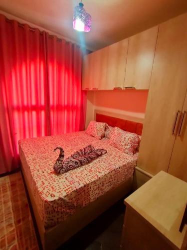 a bedroom with a bed with a duck on it at Porto matrouh in Marsa Matruh