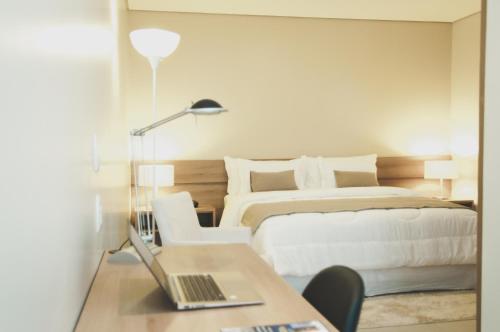 Katil atau katil-katil dalam bilik di Nobile Suites Gran Lumni