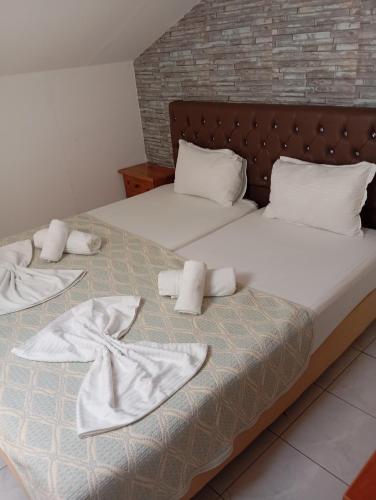 Katil atau katil-katil dalam bilik di Apartments Gregory & George