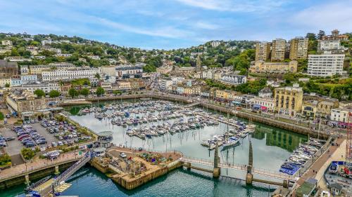 an aerial view of a harbor with boats in the water at The Moorings - Duplex apartment on Torquay Marina with Hot Tub in Torquay