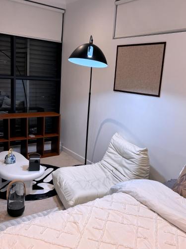 Llit o llits en una habitació de Private room with Balcony