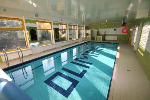 Bazén v ubytovaní Olimpia Resort & SPA alebo v jeho blízkosti