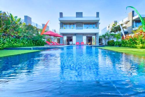 Πισίνα στο ή κοντά στο Laura 2 BR Beachfront Villa JU29