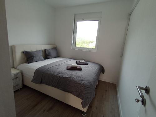 Postel nebo postele na pokoji v ubytování Villa Roki